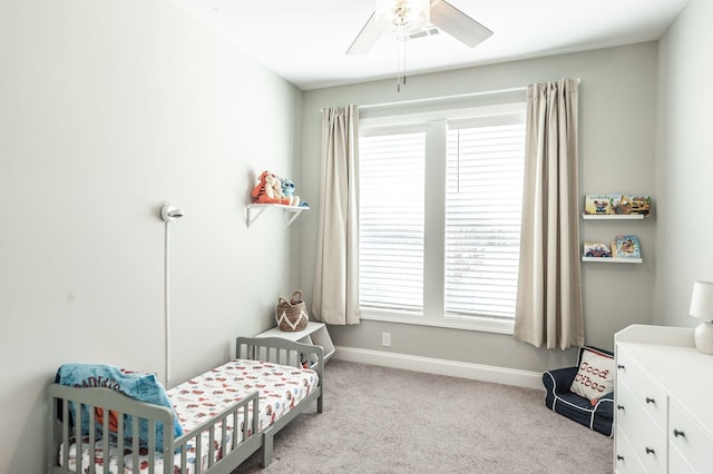 bedroom featuring carpet flooring, baseboards, and ceiling fan