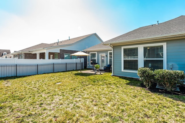 view of yard with a patio area and fence