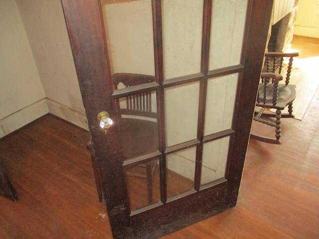 stairway featuring wood finished floors