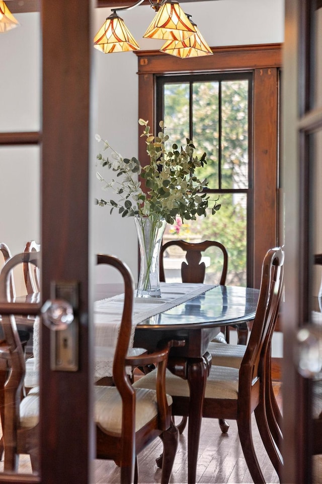 dining space featuring wood finished floors