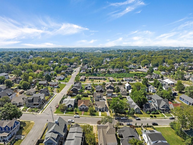 birds eye view of property with a residential view