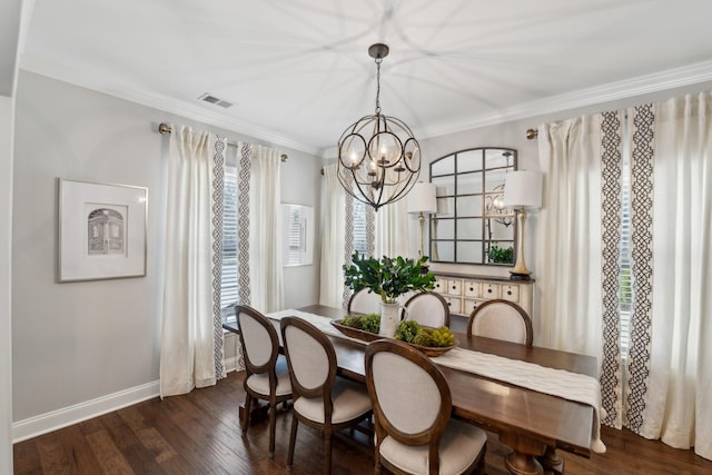 dining room with visible vents, a notable chandelier, ornamental molding, baseboards, and dark wood-style flooring