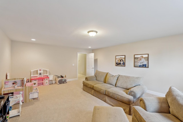 living room featuring recessed lighting, baseboards, and carpet flooring