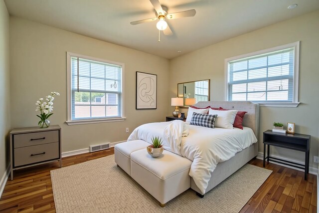 18 Old Jackson Hwy, Leoma, TN 38468 - bedroom with dark wood-type flooring, baseboards, and ceiling fan
