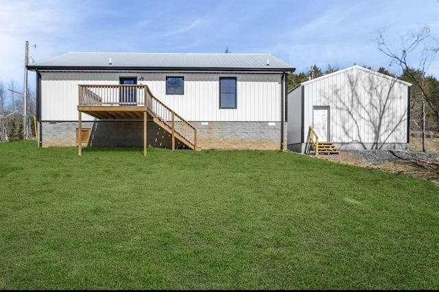 rear view of property featuring entry steps, a yard, metal roof, and crawl space