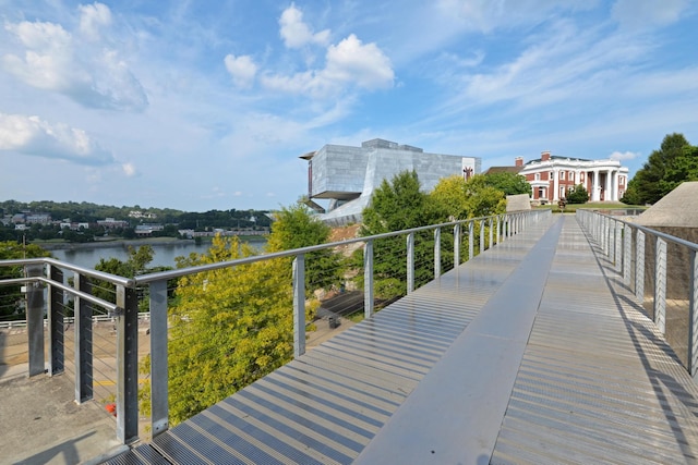 surrounding community featuring a water view