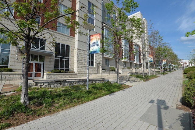 exterior space featuring brick siding