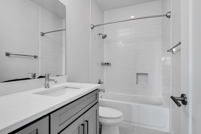 bathroom featuring vanity, toilet, and shower / bath combination