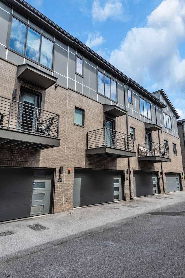 view of building exterior featuring an attached garage