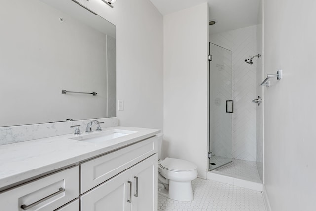 full bath featuring toilet, a stall shower, vanity, and tile patterned flooring