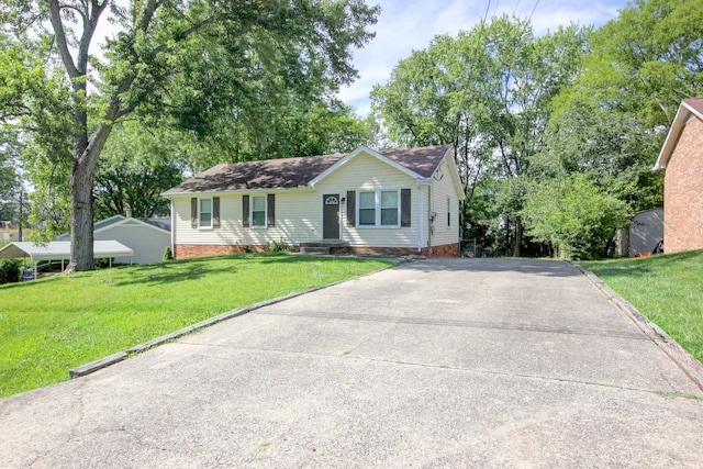 single story home with a front yard, driveway, and crawl space