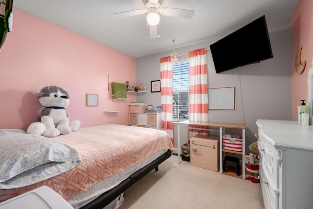 bedroom featuring carpet flooring and a ceiling fan