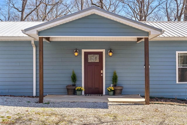 property entrance with metal roof