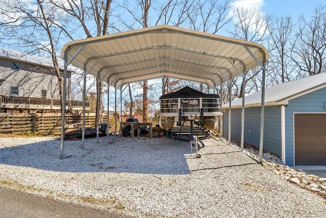 exterior space featuring a detached carport and a garage