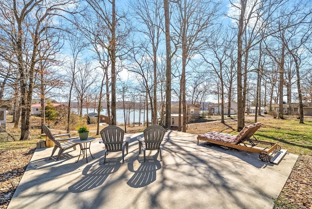 view of patio / terrace with a water view