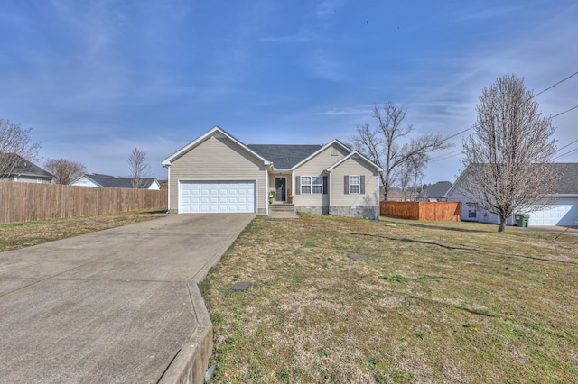 ranch-style house featuring driveway, a front yard, a garage, and fence