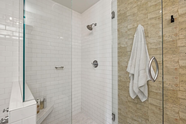 bathroom featuring a stall shower