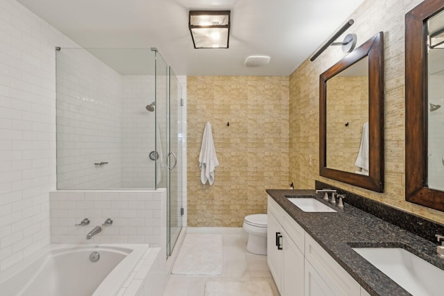 bathroom featuring a sink, tile walls, a bath, and a shower stall