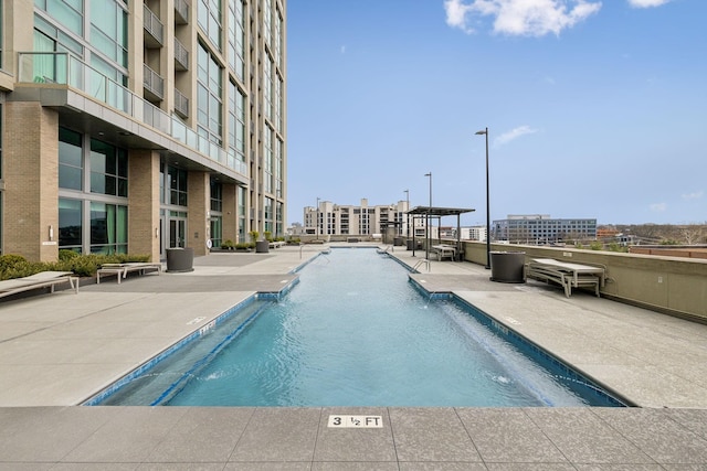 community pool featuring a patio