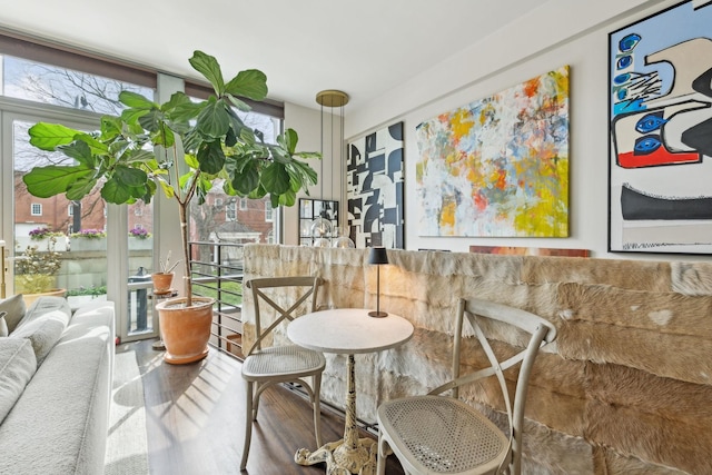 dining space featuring wood finished floors