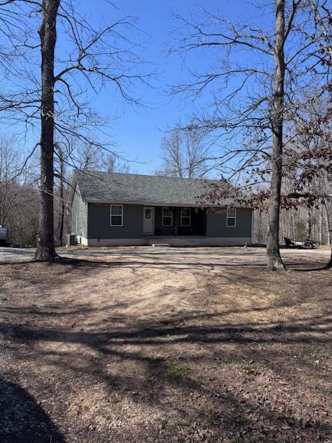 262 Rockhouse Rd, Hohenwald, TN 38462 - view of front facade with covered porch and driveway