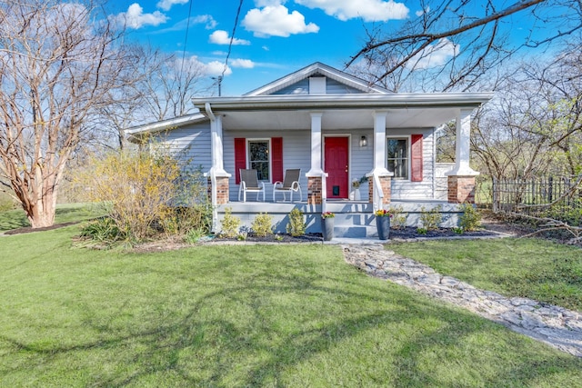 view of front of house featuring a porch and a front yard