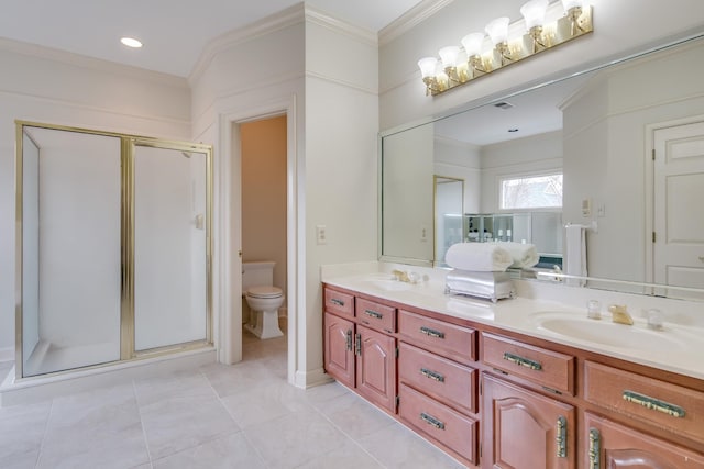 bathroom featuring double vanity, crown molding, a stall shower, and a sink