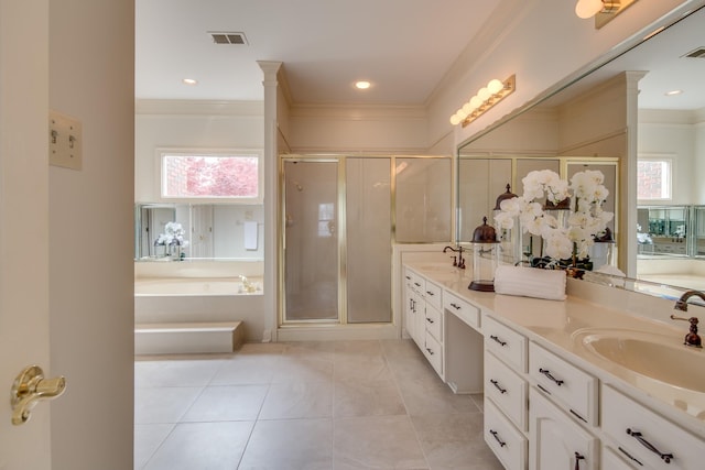 bathroom featuring visible vents, double vanity, a stall shower, a sink, and crown molding