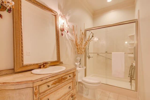 bathroom featuring tile patterned floors, toilet, ornamental molding, a shower stall, and vanity