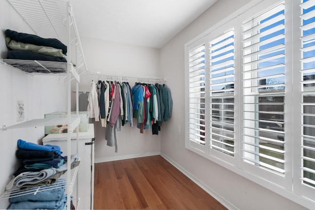 spacious closet with wood finished floors