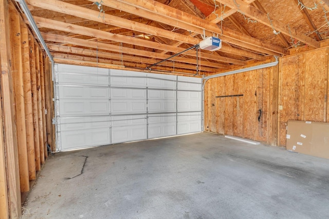 garage featuring a garage door opener