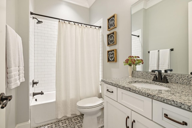 bathroom featuring shower / bath combo with shower curtain, toilet, and vanity