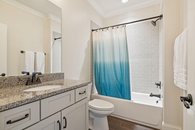 full bathroom with wood finish floors, toilet, ornamental molding, shower / bath combination with curtain, and vanity