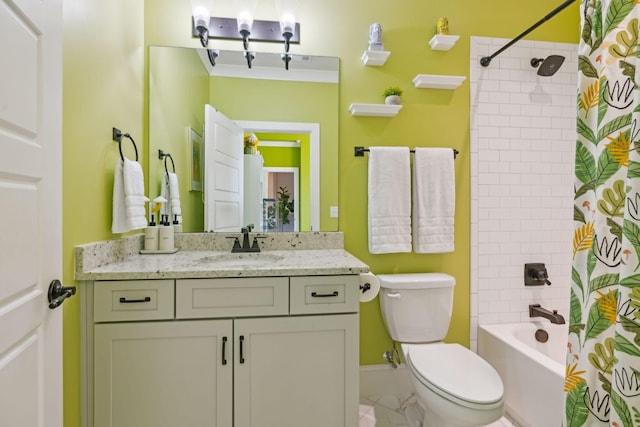 full bath with toilet, marble finish floor, shower / bath combo, and vanity