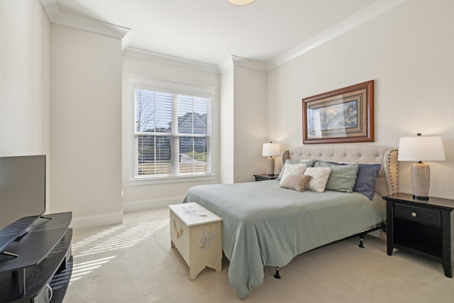 bedroom featuring crown molding, baseboards, and light carpet