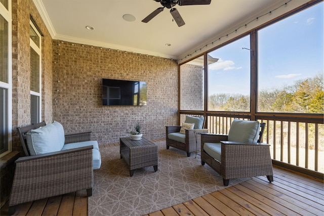 deck featuring an outdoor living space and a ceiling fan