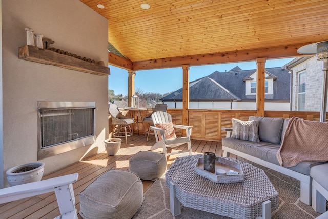 view of patio / terrace featuring an outdoor living space and a wooden deck