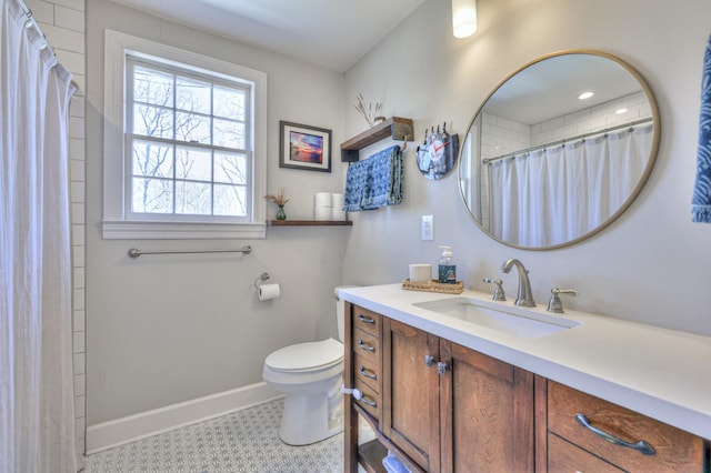 full bathroom featuring baseboards, toilet, a shower with shower curtain, tile patterned floors, and vanity