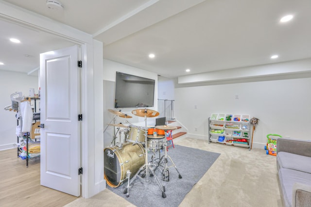 rec room with light wood-style flooring, recessed lighting, and baseboards