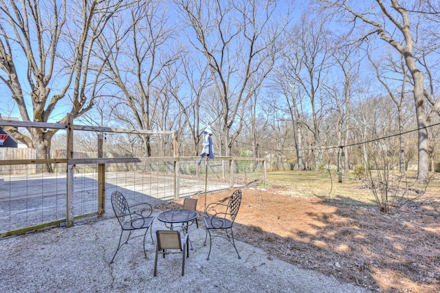 view of patio with fence