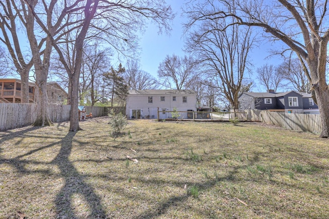 view of yard featuring a fenced backyard