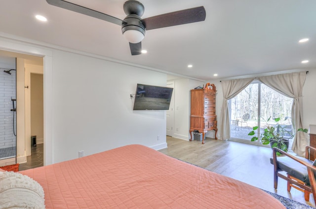 bedroom featuring ornamental molding, wood finished floors, recessed lighting, baseboards, and access to exterior