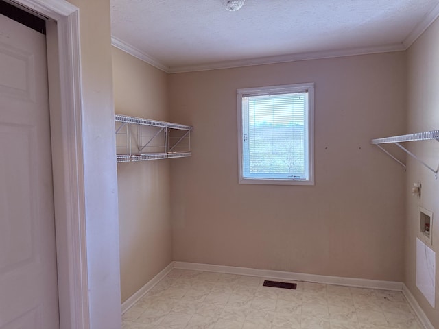 washroom featuring laundry area, hookup for a washing machine, baseboards, and visible vents