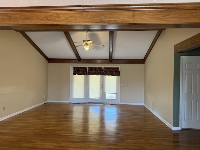 unfurnished living room featuring baseboards, a ceiling fan, wood finished floors, and vaulted ceiling with beams