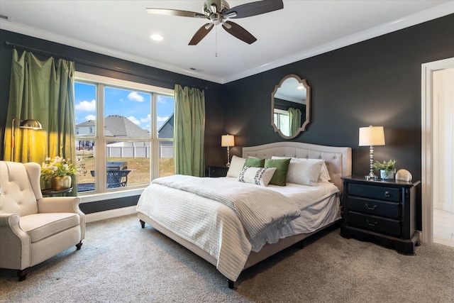 bedroom featuring a ceiling fan, baseboards, visible vents, and carpet floors