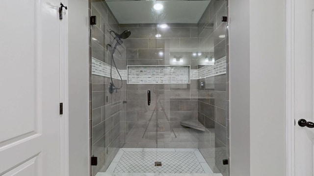 bathroom with a shower stall