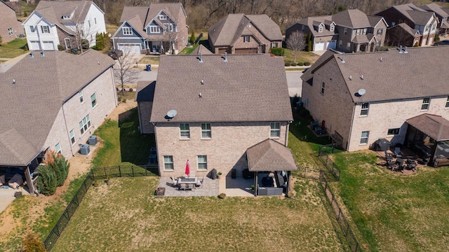 drone / aerial view with a residential view