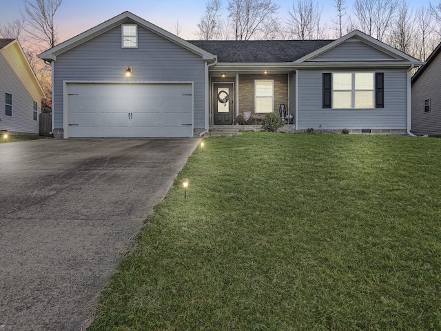 ranch-style home featuring driveway, a front lawn, central AC unit, and an attached garage