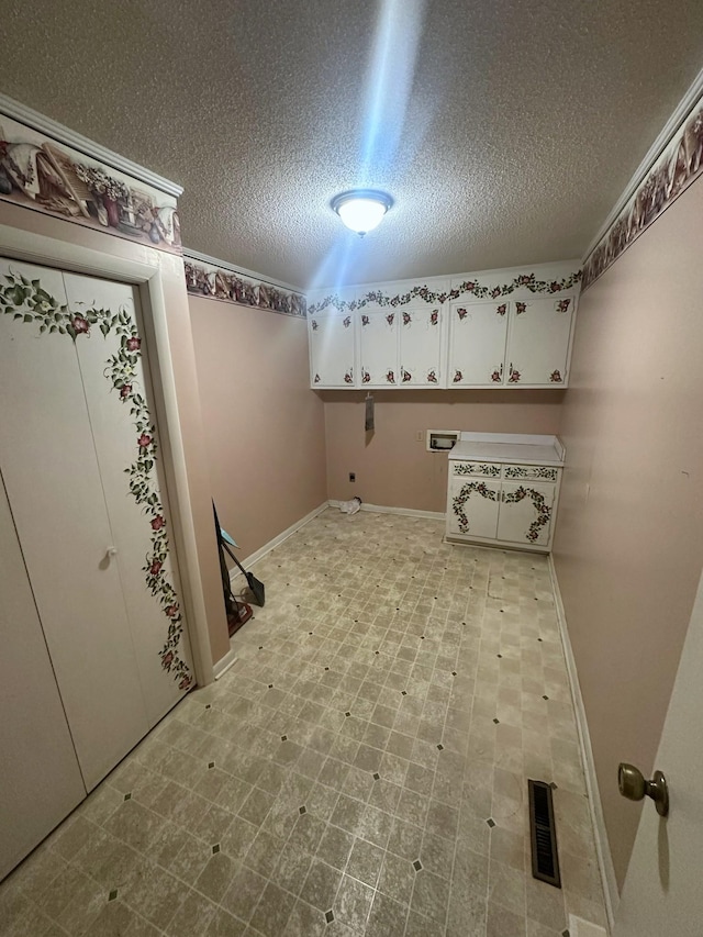 laundry area with visible vents, washer hookup, cabinet space, hookup for an electric dryer, and light floors