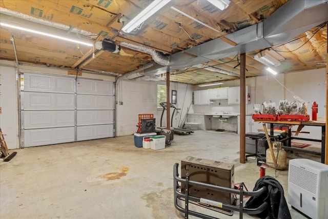 134 N Forrest Ave, Camden, TN 38320 - garage with a garage door opener